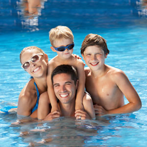 Family Swimming in Pool